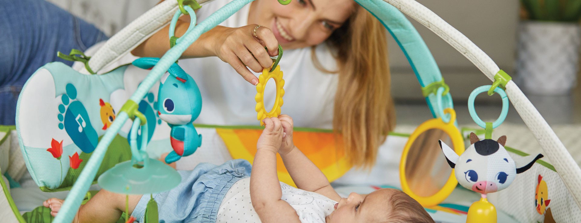   Comfortably play and bond with your baby while fostering language skills
