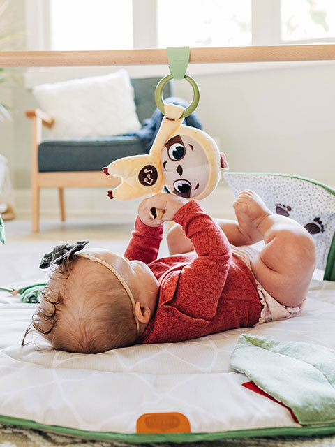 Baby-activated musical sloth supports cognitive development